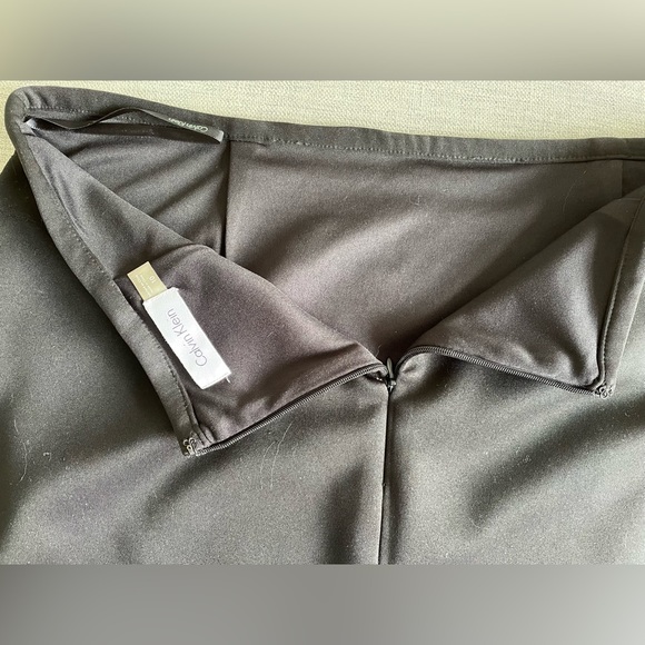 Calvin Klein skirt with geometric laser cut at the hem. Size 10 - Picture 6 of 6